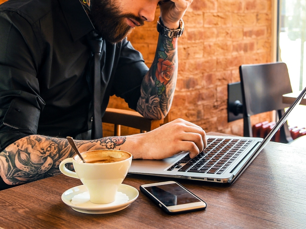 man working at laptop